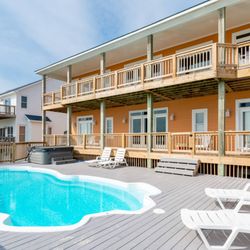 Emerald Isle Realty - Enjoy pool relaxation at Luxury Sands vacation property in Emerald Isle