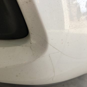 Mile High Customs - bottom passenger side of the bumper, trying to line up 4 pieces. - Vehicle Wraps Near Me - Denver, Colorado Mile High Customs - bottom passenger side of the bumper, trying to line up 4 pieces. - Vehicle Wraps Near Me - Denver, Colorado