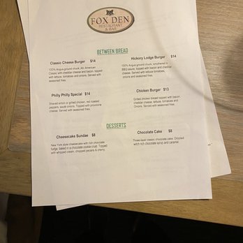Fox Den - a menu on a wooden table - Pizza Near Me - Pigeon Forge, Tennessee