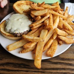 Bohicas Pub And Grub - Cheeseburger on delicious bun & French fries, so good