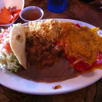 Ray's Drive Inn - Mexican Plate: puffy taco, carne guisada 2 cheese enchiladas, rice, beans. Skip all the fluff... just get the PUFFY TACO! - Tex-Mex Near Me - San Antonio, Texas