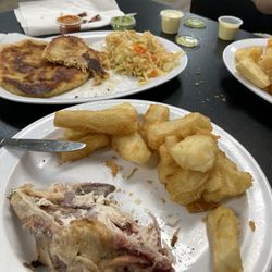 Quarter chicken and double yucca + pupusas in the background