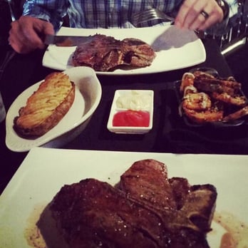 Flame Steakhouse - Porterhouse with lyonnaise potatoes. - Steakhouses Near Me - Springfield, Missouri