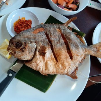 Awang Kitchen - Fried Pompano - tasty with a black sauce not pictured. - Indonesian Near Me - Elmhurst, New York