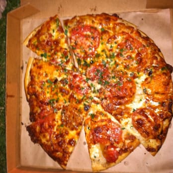 Cheese Board Pizza - Fresh heirloom tomato, red onions, gruyere cheese, mozzarella, fresh herbs, garlic oil - Pizza Near Me - Berkeley, California Cheese Board Pizza - Fresh heirloom tomato, red onions, gruyere cheese, mozzarella, fresh herbs, garlic oil - Pizza Near Me - Berkeley, California