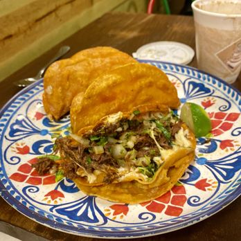 Tacotlan - The inside of a quesabirria taco! - Mexican Near Me - Chicago, Illinois