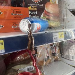 Dollar General - Exploded Can in Freezer Section