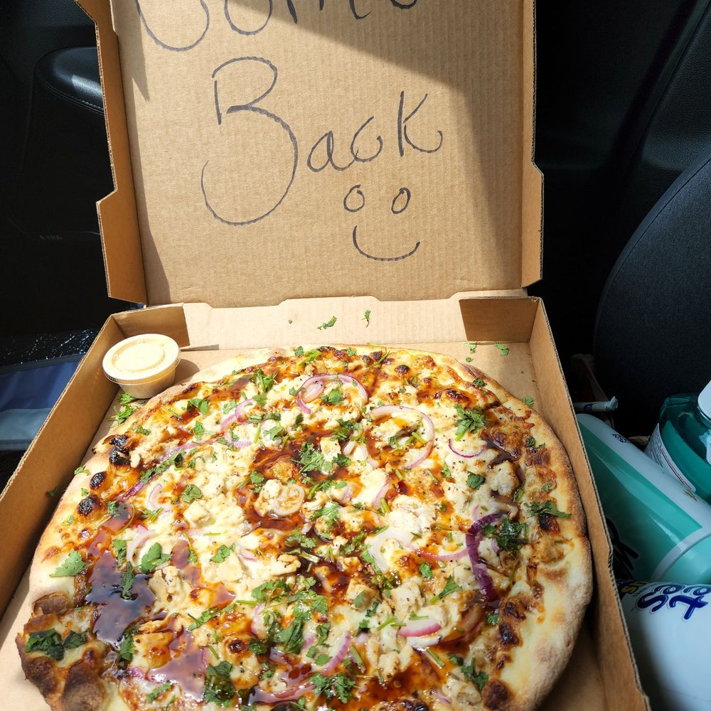 Zalat Pizza - a pizza in a box with some basil written on it - Pizza Near Me - Dallas, Texas Zalat Pizza - a pizza in a box with some basil written on it - Pizza Near Me - Dallas, Texas