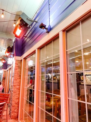 Photo of Anna Maria Oyster Bar - Bradenton, FL, US. The heaters outside patio