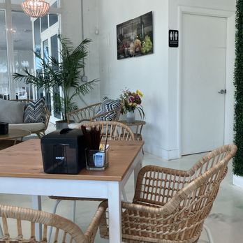 Monada Cafe - Tables inside and a long counter - Cafes Near Me - Lake Worth, Florida Monada Cafe - Tables inside and a long counter - Cafes Near Me - Lake Worth, Florida