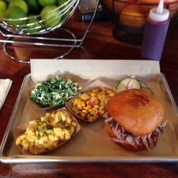 Hogwood BBQ - Pulled Pork Sandwich with Mac n Cheese, Kale Slaw, Skillet Corn, & Pickles.