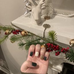 Nails by Tyler, very nice guy too. Came in with an idea and it's perfect for Christmas!