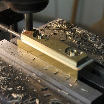 Turner & Associates - Machining stage of custom brass cabinet hardware - Cabinetry Near Me - Saint Louis, Missouri Turner & Associates - Machining stage of custom brass cabinet hardware - Cabinetry Near Me - Saint Louis, Missouri