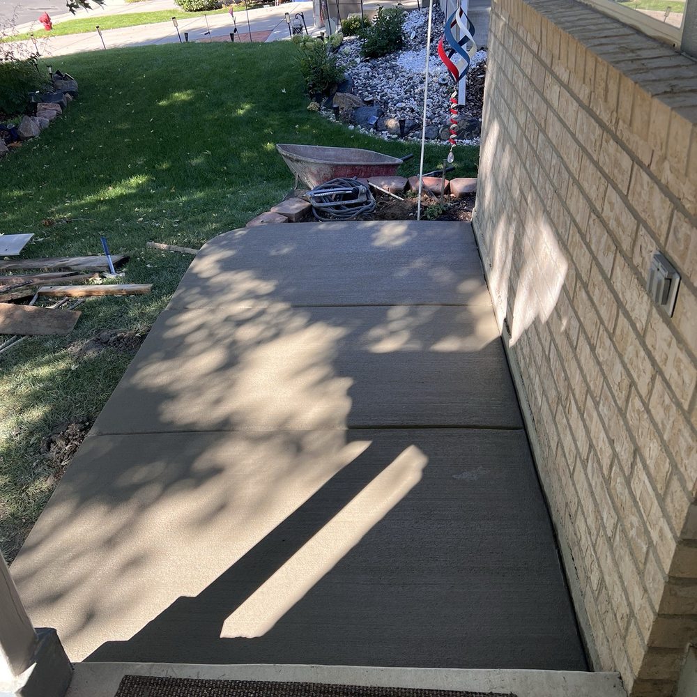 Andies Concrete - Added this slab in front to be able to sit outside. - Masonry/Concrete Near Me