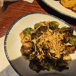Crispy Brussels Sprouts. The sauce they pour, not drizzle over them made them not crispy but a mushy mess.