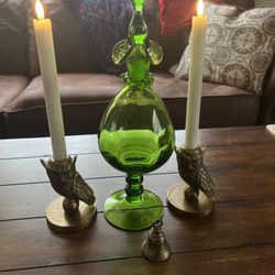 Wild Things Floral and Gifts - Candle holders, bell and the electric candles with remote came from Wild Things! Love love love them. The candle holders are metal!