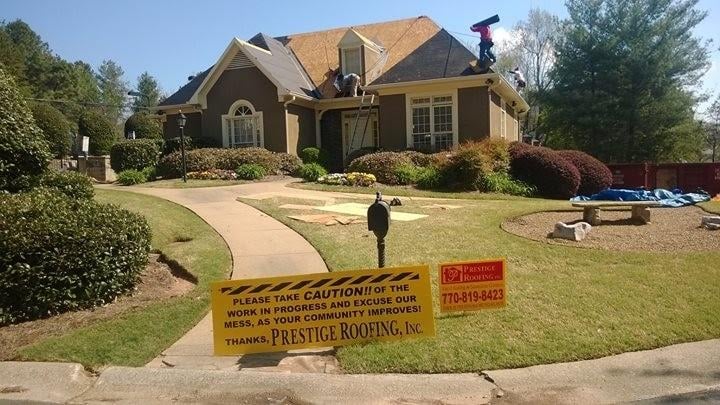 Slide of Prestige Roofing & Exteriors