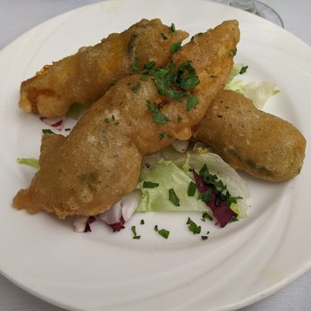 Emilia's Restaurant - Zucchini flowers stuffed with mozzarella - Italian Near Me - Bronx, New York Emilia's Restaurant - Zucchini flowers stuffed with mozzarella - Italian Near Me - Bronx, New York