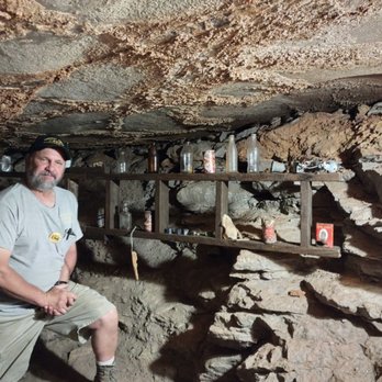 Crystal Onyx Cave - Owner of Crystal Onyx cave with the "artifacts" he found while renovating the cave. - Landmarks & Historical Buildings Near Me - Cave City, Kentucky Crystal Onyx Cave - Owner of Crystal Onyx cave with the "artifacts" he found while renovating the cave. - Landmarks & Historical Buildings Near Me - Cave City, Kentucky