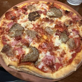 Giovanni's Pizzeria & Kitchen - Personal meat pizza! - Italian Near Me - Oviedo, Florida Giovanni's Pizzeria & Kitchen - Personal meat pizza! - Italian Near Me - Oviedo, Florida
