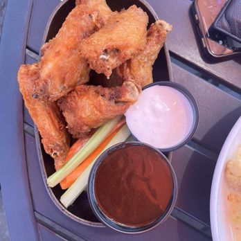 Uncommon Grill - Chicken wings with bbq sauce and blue cheese. - New American Near Me - Watertown, Connecticut Uncommon Grill - Chicken wings with bbq sauce and blue cheese. - New American Near Me - Watertown, Connecticut