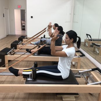 Alma Pilates - Rowing series. Reformer class. - Yoga Near Me - Doral, Florida Alma Pilates - Rowing series. Reformer class. - Yoga Near Me - Doral, Florida