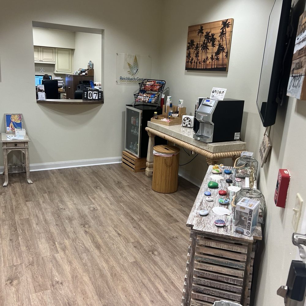 Reichbach Center - The waiting room with coffee bar and treats such as soda, water, tea, cookies, trail mix, crackers, chips, and chocolates. - Medical Cannabis Referrals Near Me - Sarasota, Florida Reichbach Center - The waiting room with coffee bar and treats such as soda, water, tea, cookies, trail mix, crackers, chips, and chocolates. - Medical Cannabis Referrals Near Me - Sarasota, Florida