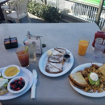 Schooner or Later - Right to left: "The mess", cinnamon french toast,crab Benedict with bloody Mary and fresh OJ - Sandwiches Near Me - Long Beach, California Schooner or Later - Right to left: "The mess", cinnamon french toast,crab Benedict with bloody Mary and fresh OJ - Sandwiches Near Me - Long Beach, California