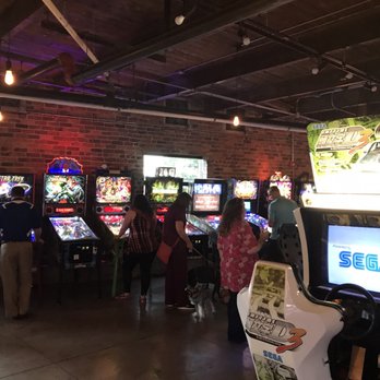 Boxcar Bar + Arcade - Well behaved dogs allowed inside on leashes! Check out the floors, exposed ceiling, and brick walls.  Lovely remodel kept the best. - Bars Near Me - Greensboro, North Carolina