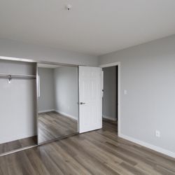 Chadron Apartments - Spacious bedroom with plenty of closet space