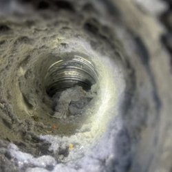 Undefiled Cleaning Solutions - Dryer Vent filled with lint and debris