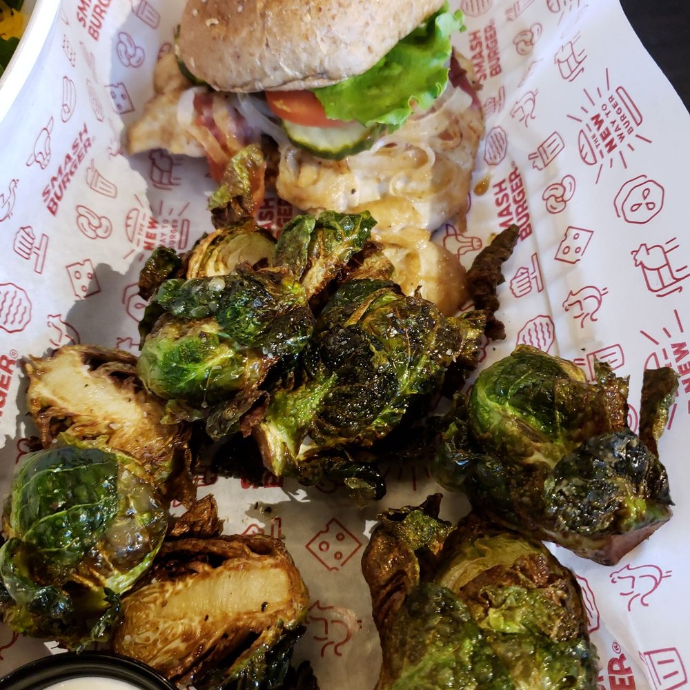 Smashburger - grilled chicken sando + bacon, lto, pickle, mustard. side of dope sprouts. $12 - Burgers Near Me - Natick, Massachusetts Smashburger - grilled chicken sando + bacon, lto, pickle, mustard. side of dope sprouts. $12 - Burgers Near Me - Natick, Massachusetts