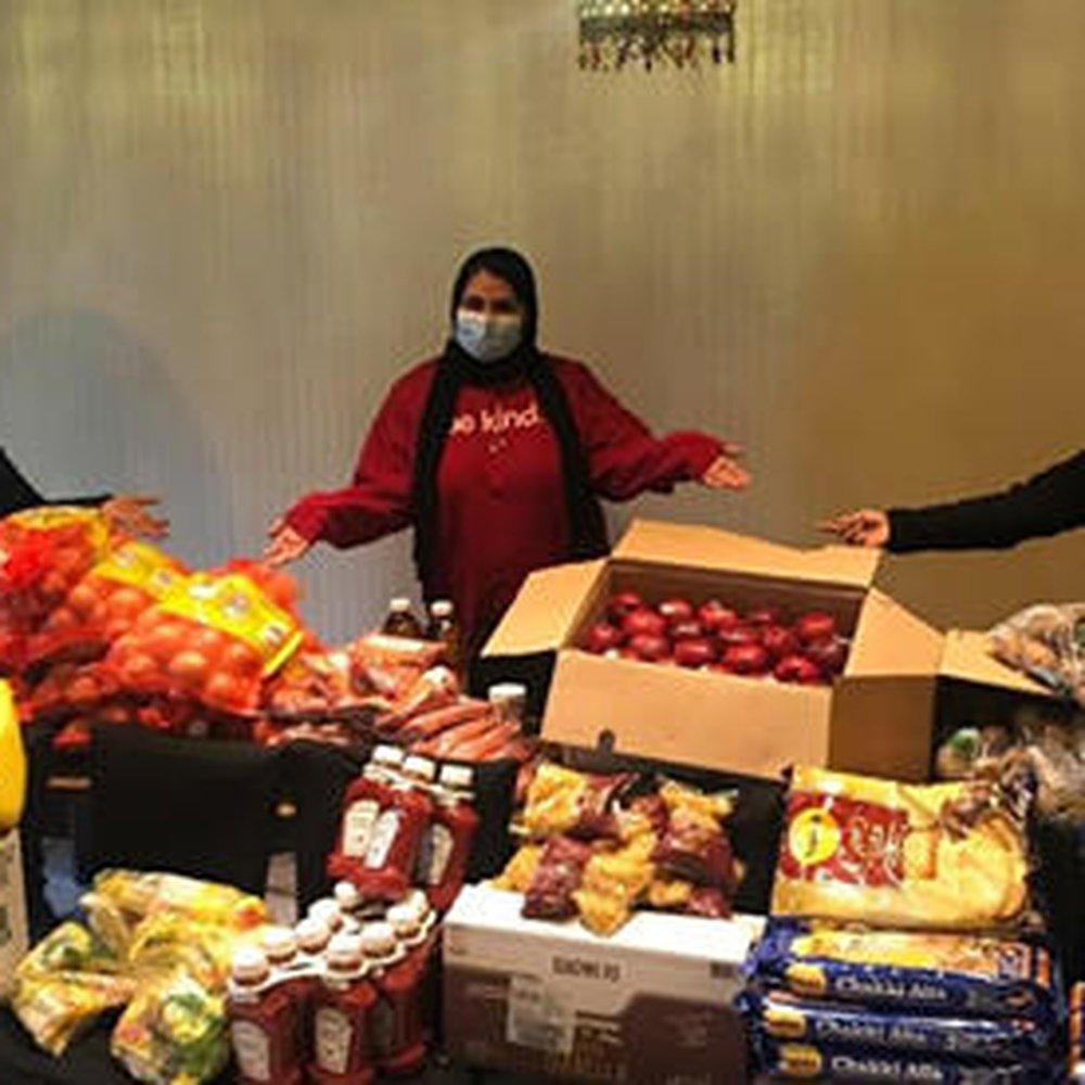 People In Need - PIN - Volunteers packing up supplies purchased with donations - Food Banks Near Me - Brooklyn, New York