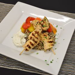 Healthy Alternative - Chicken Souvlaki & Tzatziki Sauce with Mediterranean Quinoa Paired with a nice glass of red wine