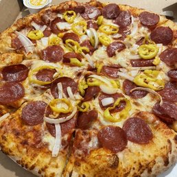 a pepperoni and onions pizza a pepperoni and onions pizza