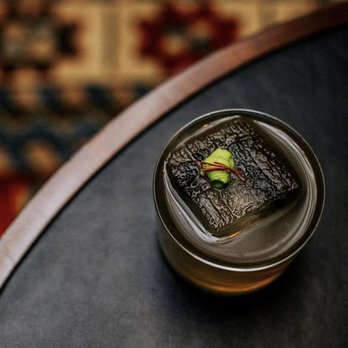 Allegory - a small piece of food on a table - Bars Near Me - Washington, DC, District of Columbia