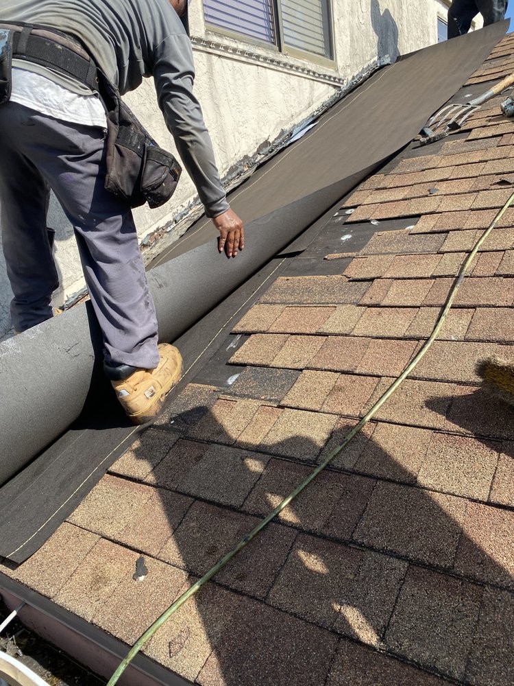 Slide of V & A Roofing