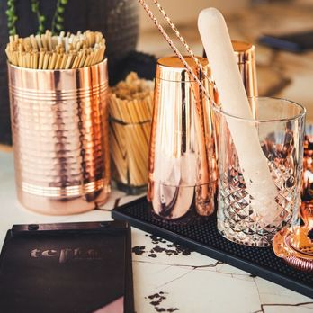 Tetto Rooftop Bar - Elegant copper cups set the tone for upscale, locally inspired bites and craft cocktails. - Wine Bars Near Me - Paso Robles, California Tetto Rooftop Bar - Elegant copper cups set the tone for upscale, locally inspired bites and craft cocktails. - Wine Bars Near Me - Paso Robles, California