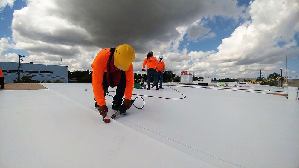 Slide of Caye Works Roofing