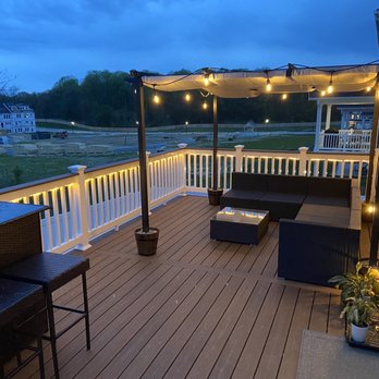 TREC Roofing and Remodeling - a deck with patio furniture - Roofing Near Me - Edgewater, Maryland TREC Roofing and Remodeling - a deck with patio furniture - Roofing Near Me - Edgewater, Maryland