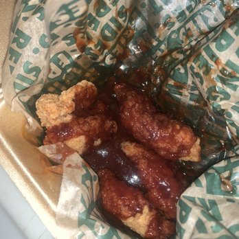 Wingstop - Wings with a poured sauce on the side - Chicken Wings Near Me - Corona, California Wingstop - Wings with a poured sauce on the side - Chicken Wings Near Me - Corona, California