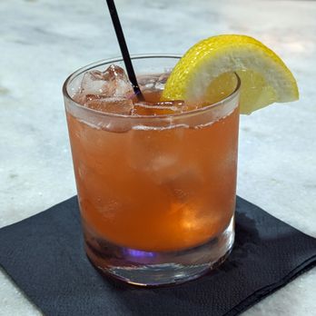 Crestwood Tavern - a drink with a lemon wedge - Bars Near Me - Birmingham, Alabama
