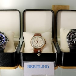 Old World Gem & Jewelry - Breitling SuperOceans wristwatches with a rare Breitling Chornomat (circa 1940s) in the middle.