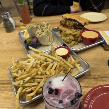 Avenue American Bistro - Garlic Parm Fries, Chicken Cesar Wrap, Brisket Sandwich, Kon Tiki, and Strawberry Mo-Tito - Sports Bars Near Me - Wayne, Michigan Avenue American Bistro - Garlic Parm Fries, Chicken Cesar Wrap, Brisket Sandwich, Kon Tiki, and Strawberry Mo-Tito - Sports Bars Near Me - Wayne, Michigan