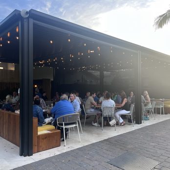 Oceano Kitchen - Outdoor dining in back - New American Near Me - Lake Worth Beach, Florida