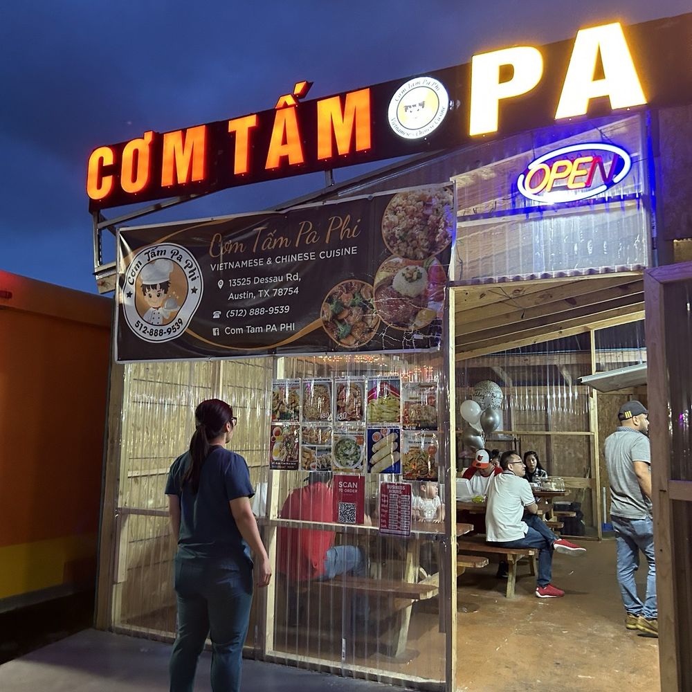 The front of the food truck. Reminiscent of eating on a bench with family back home. The front of the food truck. Reminiscent of eating on a bench with family back home.