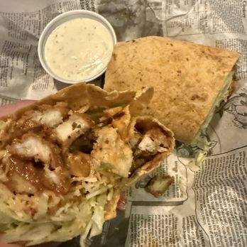 Longshots Bar & Grill - Chicken wrap, crispy chicken with the garlic chili wing sauce - Sports Bars Near Me - Woodward, Oklahoma Longshots Bar & Grill - Chicken wrap, crispy chicken with the garlic chili wing sauce - Sports Bars Near Me - Woodward, Oklahoma