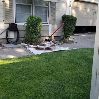 Cernas Lawn Care - a house with a broken window - Irrigation Near Me Cernas Lawn Care - a house with a broken window - Irrigation Near Me