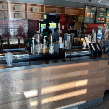 Starbucks - the counter of a starbucks coffee shop - Coffee & Tea Near Me - Bradenton, Florida Starbucks - the counter of a starbucks coffee shop - Coffee & Tea Near Me - Bradenton, Florida