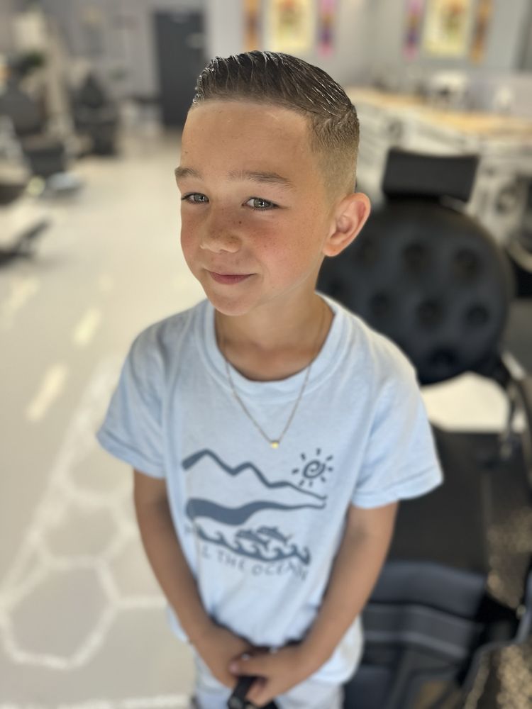 Manetain Barbershop Logo